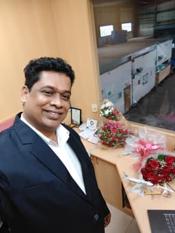 S Parthiban at his desk at Stock Market Training Academy